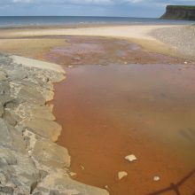 Mine water discharge onto the beach at Saltburn