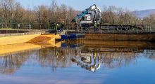 Heat exchangers being installed into the treatment lagoons at Lindsay, Wales