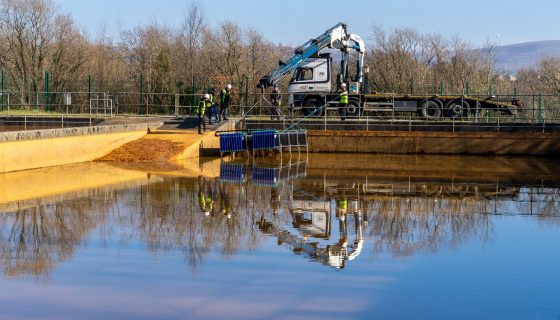 Heat exchangers being installed into the treatment lagoons at Lindsay, Wales